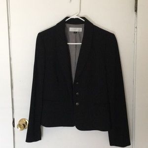 Three piece pinstriped skirt suit